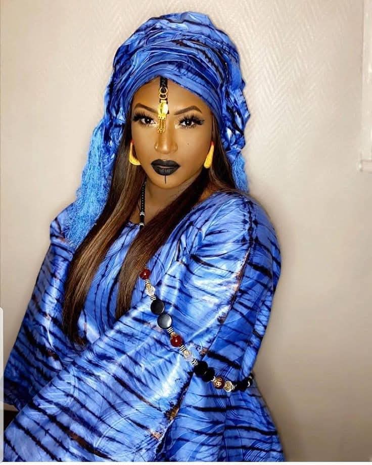 Woman in elegant blue headwrap
