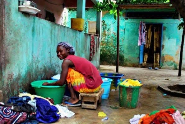 Everyday life scene, woman doing laundry